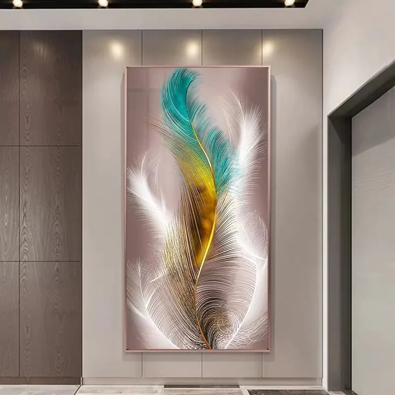 Decorative wall art of a feather on a light gray wall.