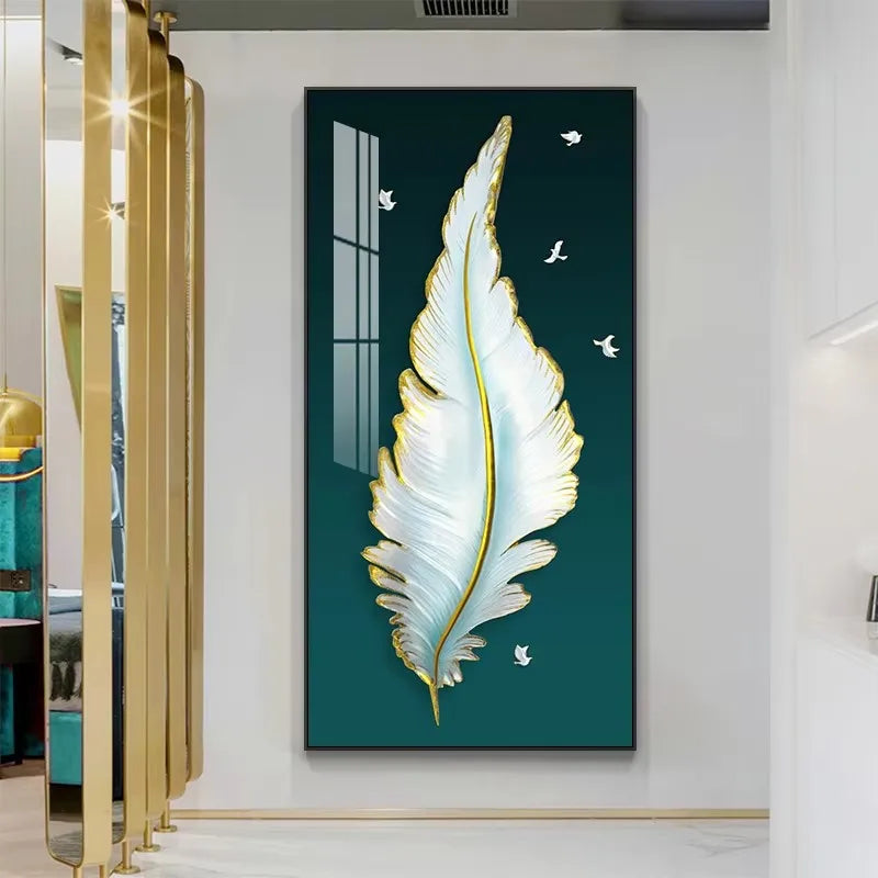Decorative wall art with a large feather design on a teal background in a modern interior setting.