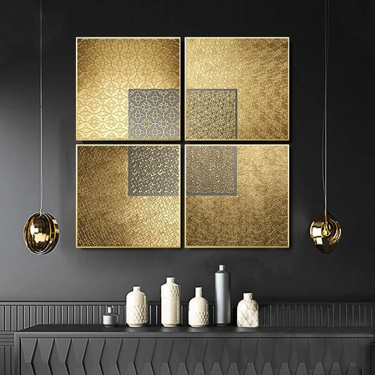 Decorative wall art with gold and silver patterns on a dark wall with vases below.