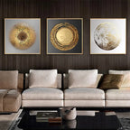 Modern living room with a sectional sofa and decorative wall art.