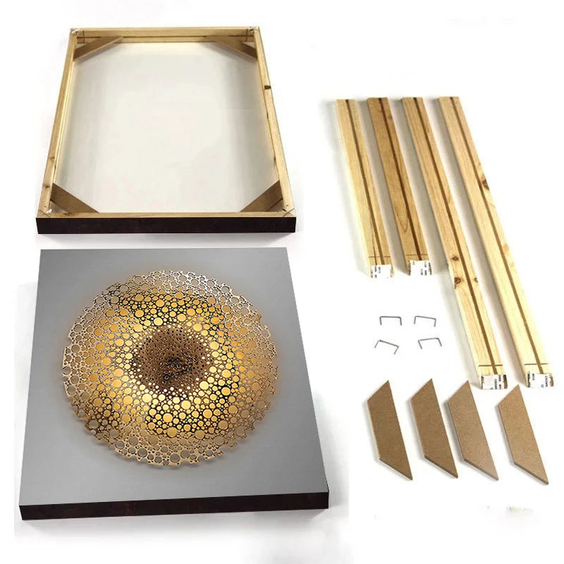 Gold wall art kit with frame, backing material, and decorative elements on a white background