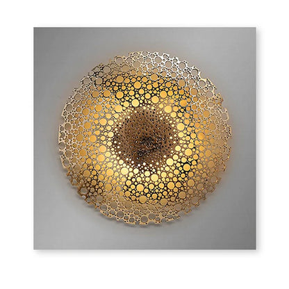 Decorative wall art with a gold circular design on a gray background