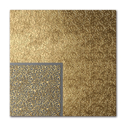Gold embossed paper with a smaller square showing the texture on a white background