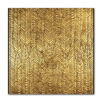 Gold leaf pattern on a white background