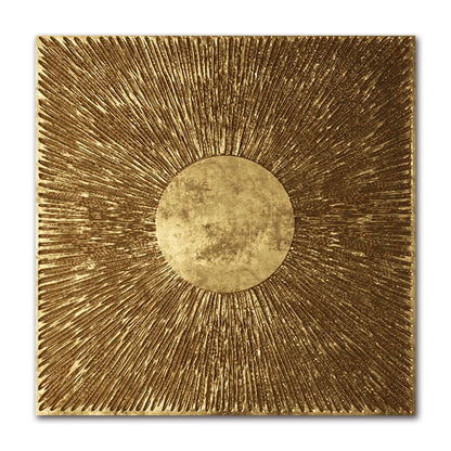 Decorative wall art with a gold sunburst design on a white background
