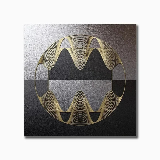 Decorative wall art with gold geometric design on a textured black and gray background