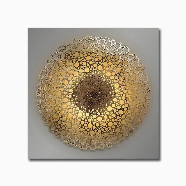 Decorative wall art with a gold circular pattern on a gray background