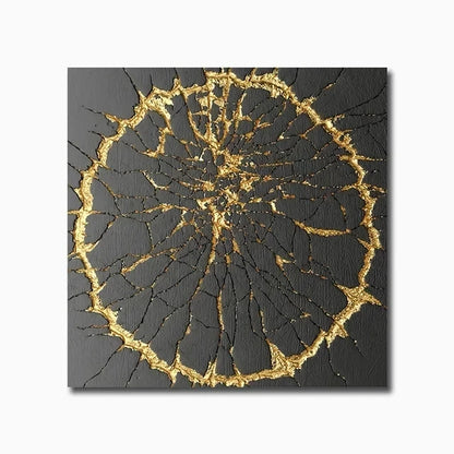 Decorative wall art with gold and black abstract design on a white background