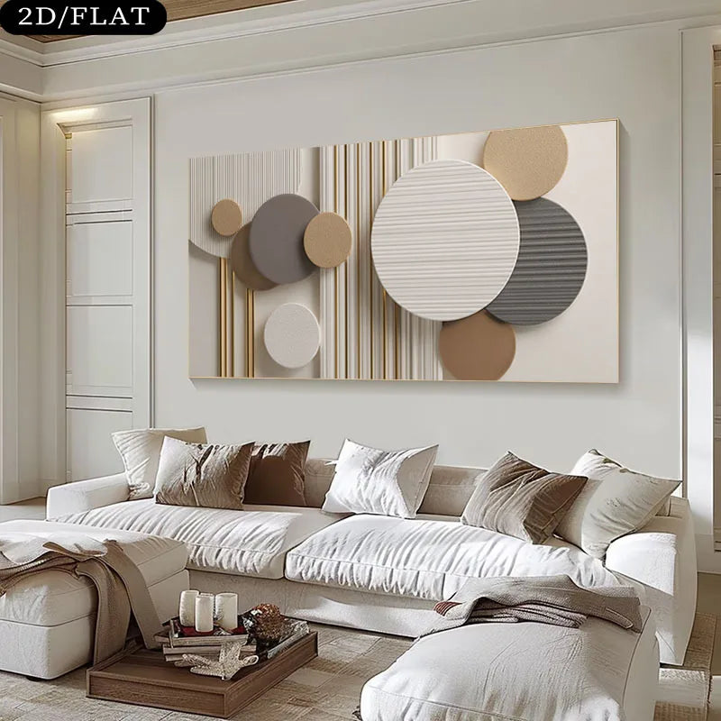 A large rectangular abstract wall art piece hangs above a white sectional sofa in a bright, modern living room. The artwork features overlapping circles and vertical stripes in beige, cream, taupe, gray, and off-white tones.