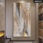 Abstract canvas wall art hanging in a modern interior hallway, featuring vertical brushstrokes in beige, white, gray, black, and gold.