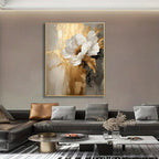 Living room with a large abstract floral painting on the wall above a sofa.