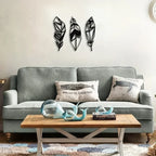 Gray sofa with decorative pillows and a wooden coffee table in a living room setting.