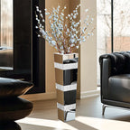 Decorative vase with floral arrangement in a modern living room setting