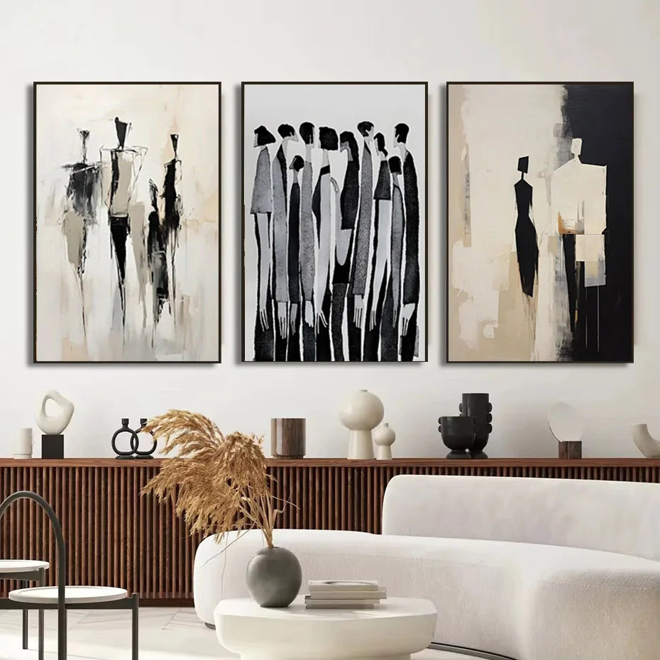 Modern living room with abstract art on the wall and decorative items on a console table.