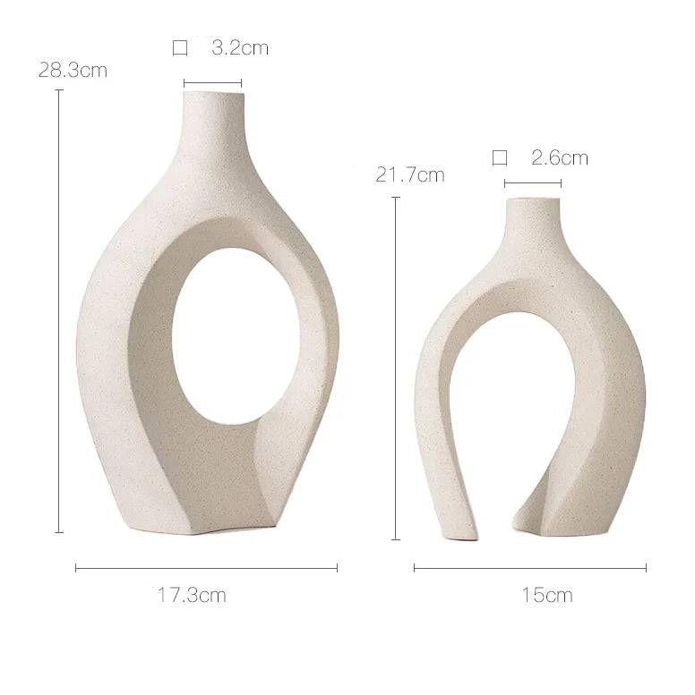 Two ceramic vases with dimensions labeled on a white background