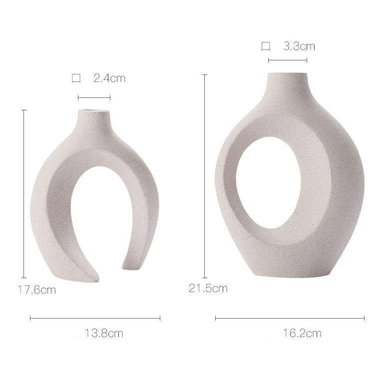 Two ceramic vases with dimensions labeled on a white background