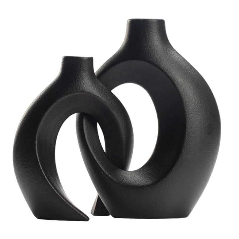 Black abstract vase on a white background