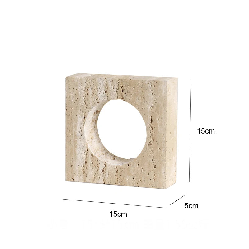Beige stone block with a circular hole and dimensions labeled on a white background