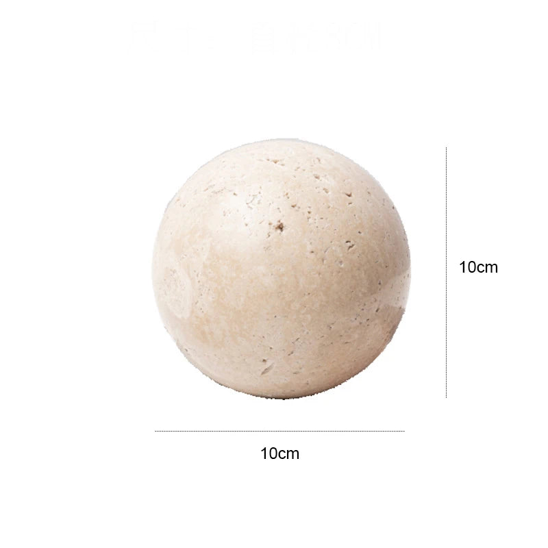 Beige spherical object with dimensions indicated on a white background