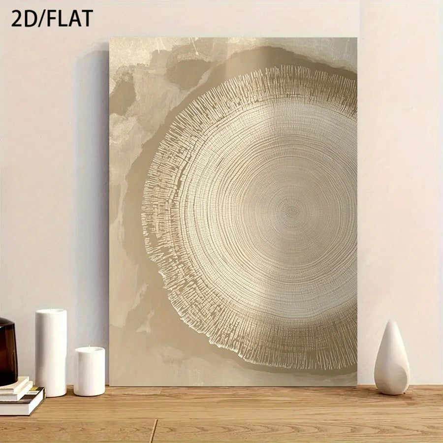 A vertical canvas wall art print featuring an abstract tree-ring design in beige, cream, and taupe tones, displayed leaning against a wall on a wooden surface with decorative white vases and books.