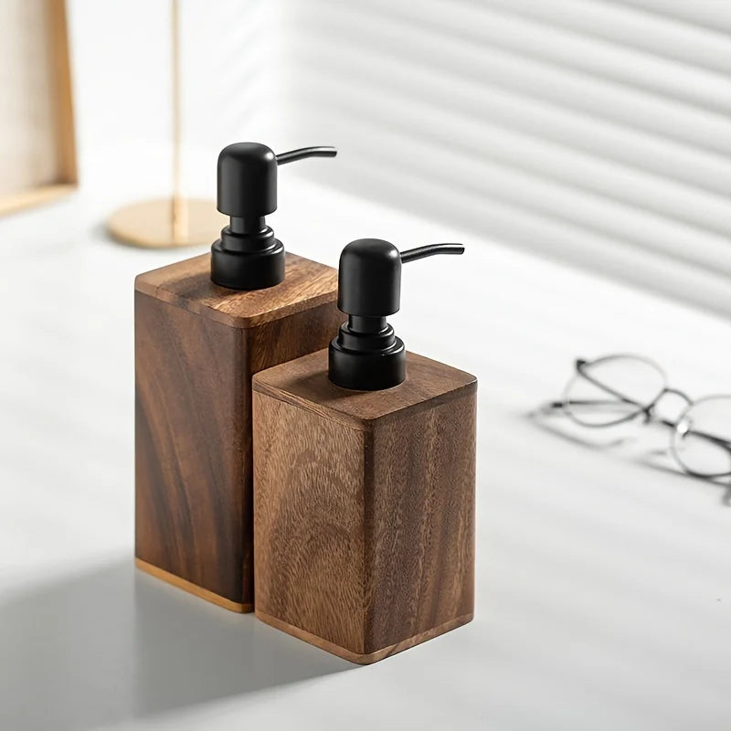 Wooden soap dispenser with black pumps on a light surface