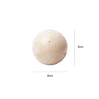 Beige sphere with dimensions labeled on a white background