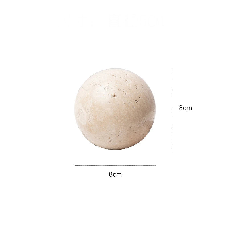 Beige sphere with dimensions labeled on a white background