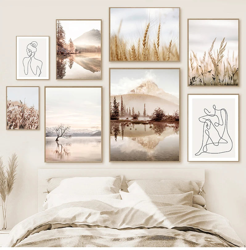 Wall art prints of nature scenes and line drawings in a bedroom setting.