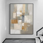 Abstract art painting on a wall in a modern interior setting