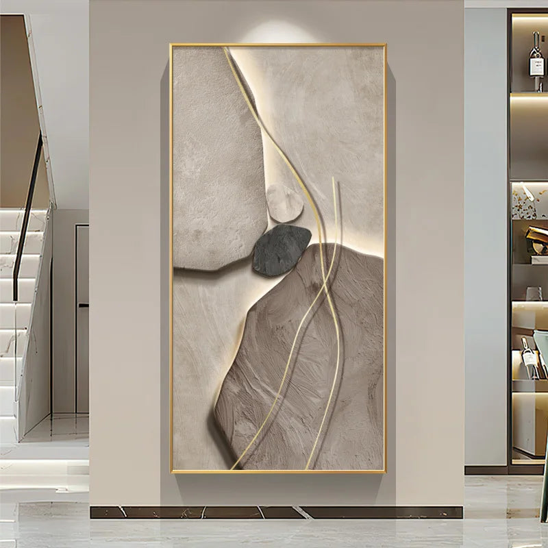 Abstract art piece with gold frame on a wall in a modern interior setting