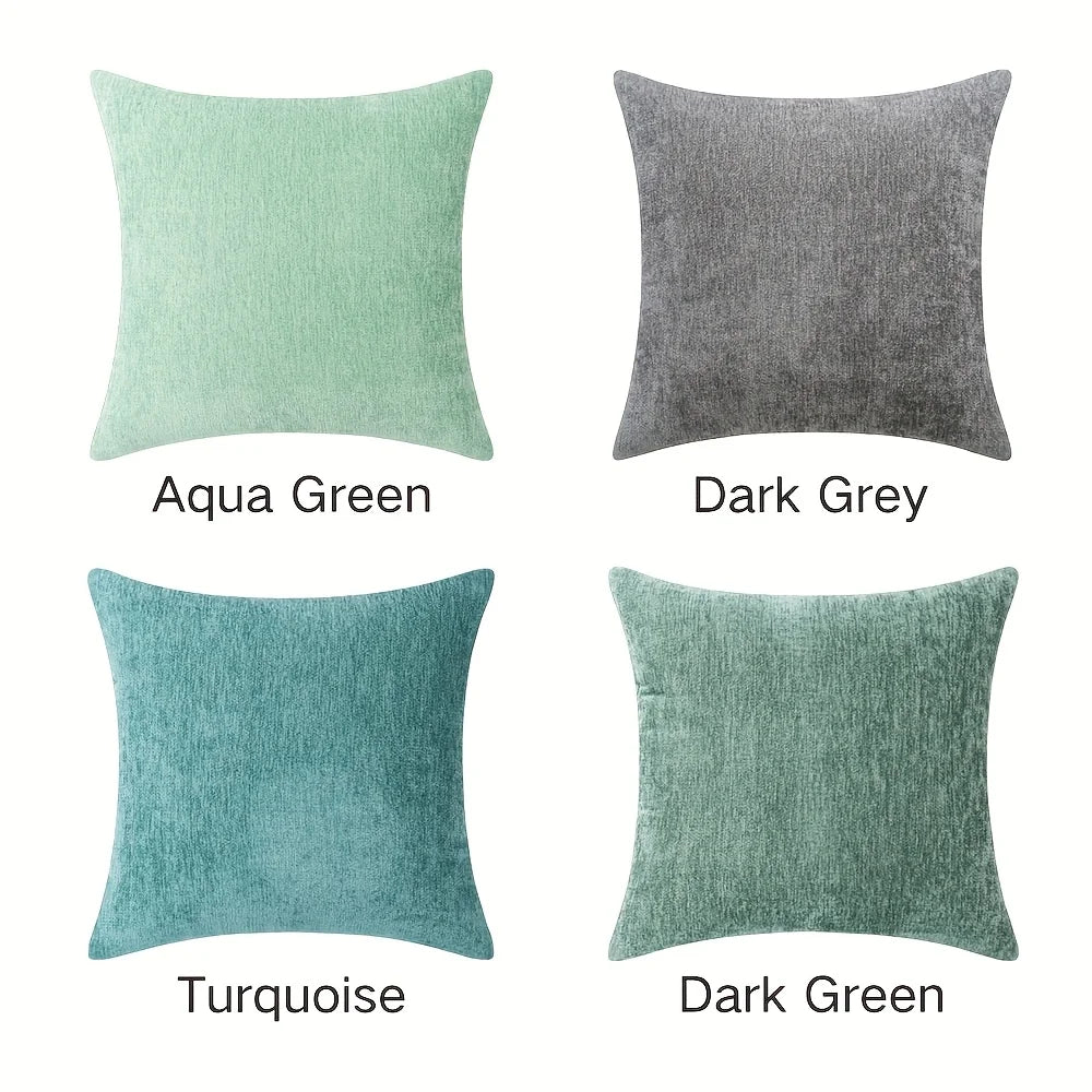 Four square pillows in different colors with labels on a white background