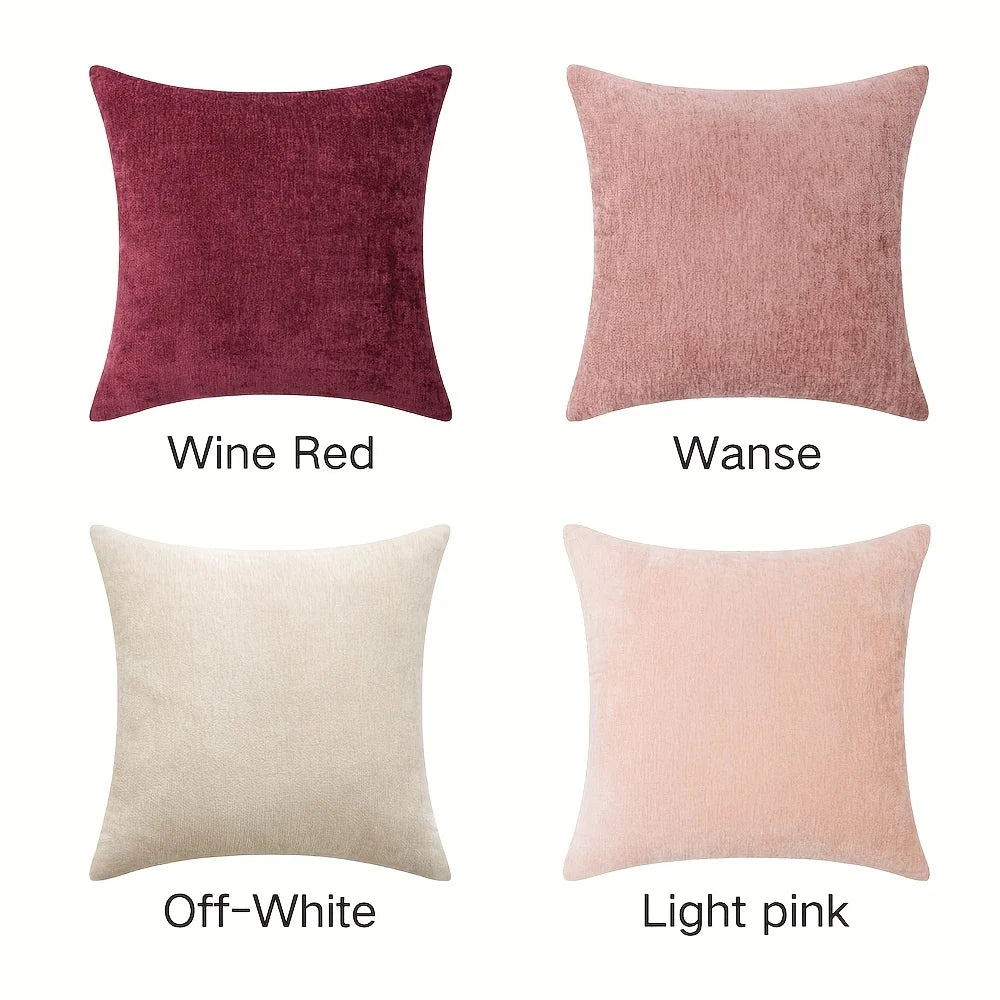 Four square pillows in different colors with labels on a white background
