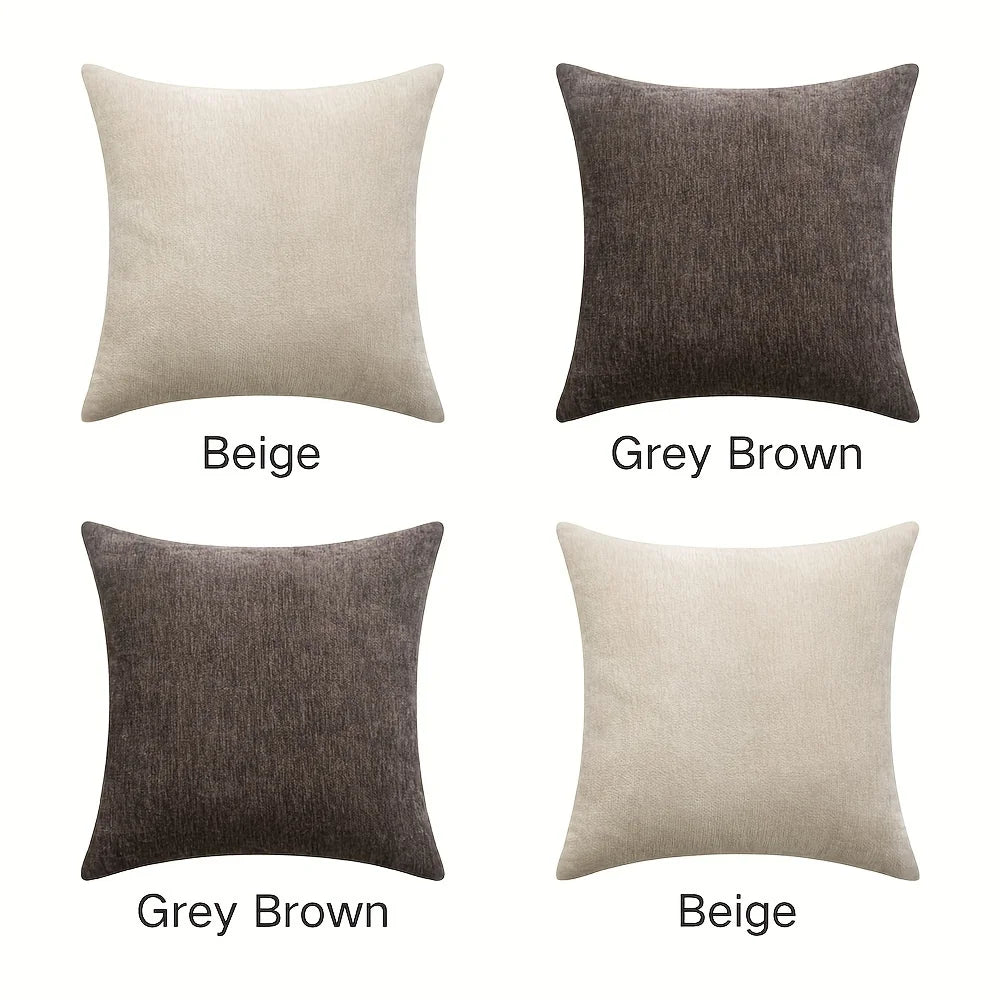 Four square pillows in beige and gray brown colors on a white background.
