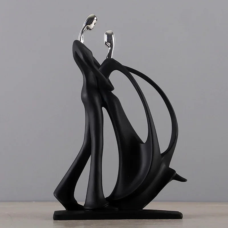 Black abstract sculpture on a gray background