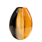 Glass vase with black and orange gradient on a white background