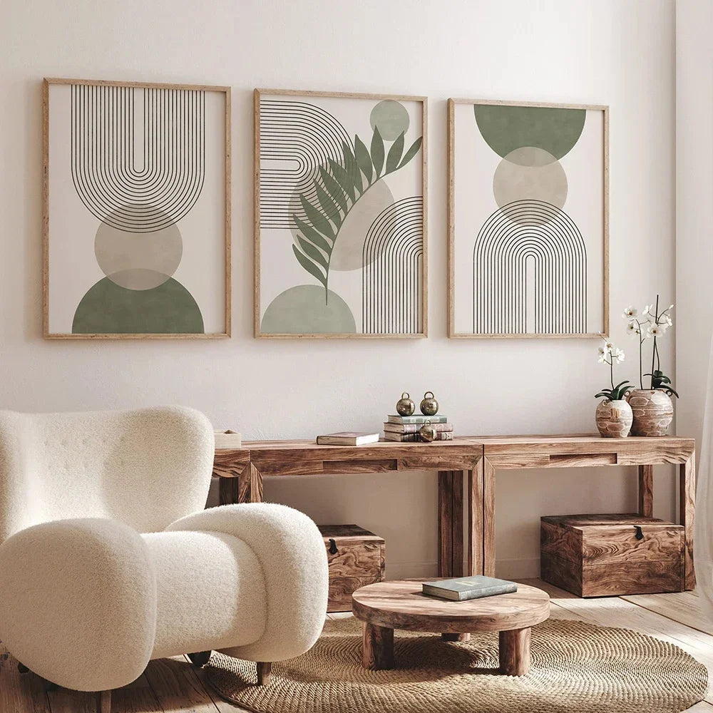 Modern living room with abstract art, a white armchair, and wooden furniture.