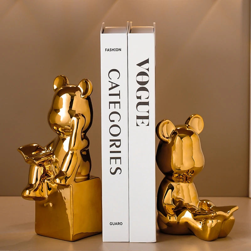 Gold bear-shaped bookends on a 'Vogue' magazine