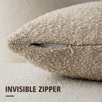 Beige textured pillow with an invisible zipper on a neutral background