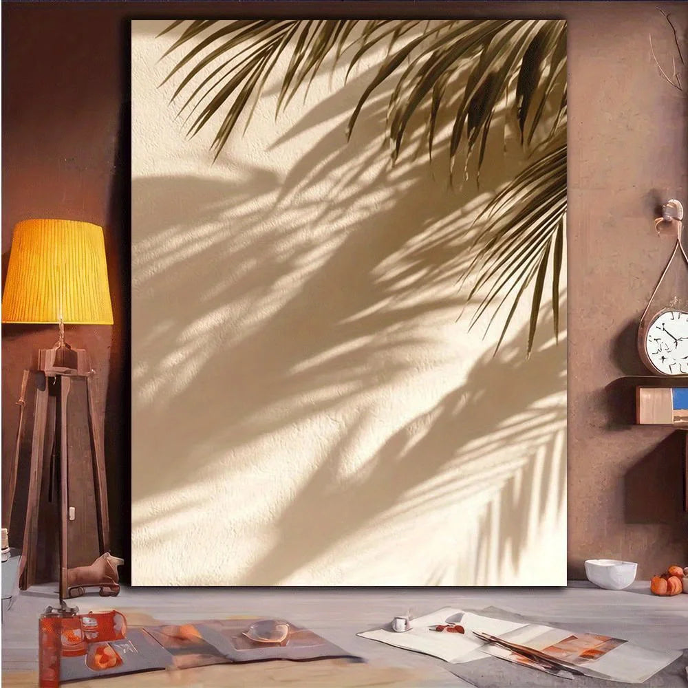 Room interior with a large wall art piece of palm leaves, a lamp, and decorative items.