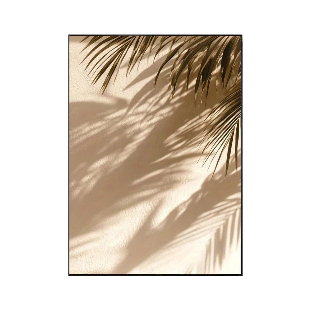 Palm leaf shadows on a beige wall