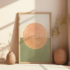 Framed abstract artwork with a sun and birds on a wall with decorative vases.
