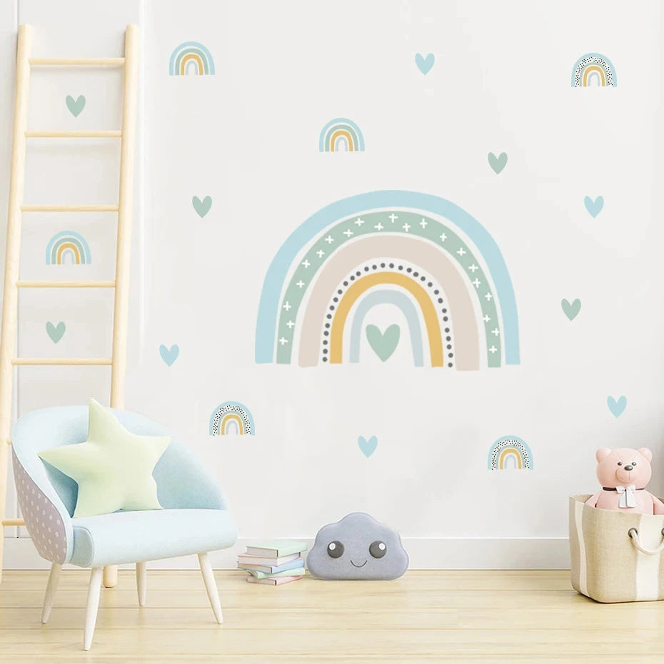 Children's room with rainbow wall decals, a chair, and toys.