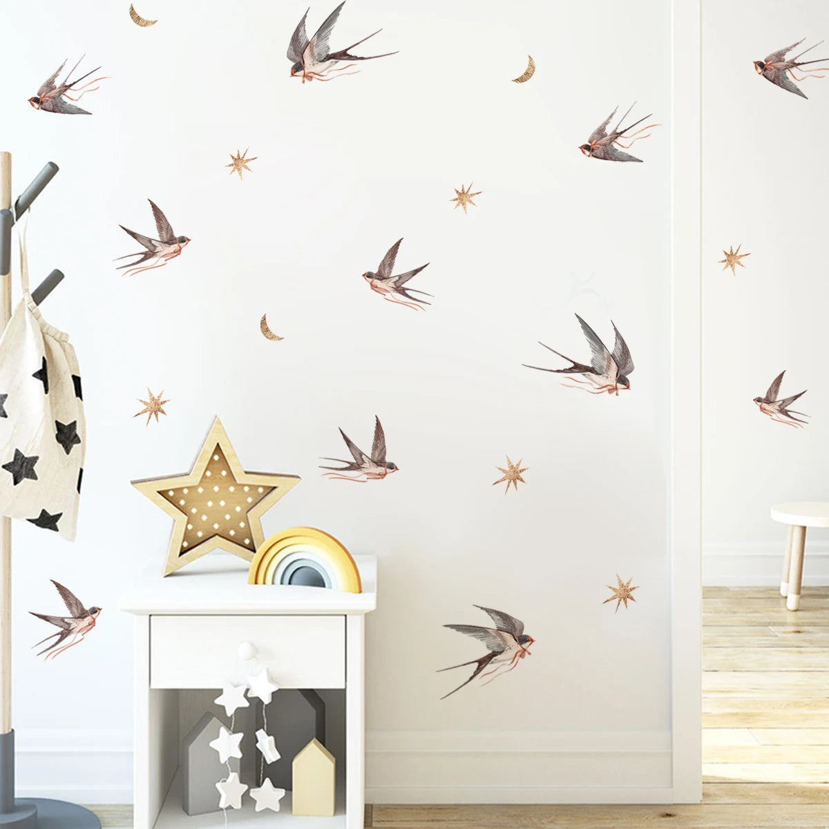 Wall with bird and star decals in a room setting