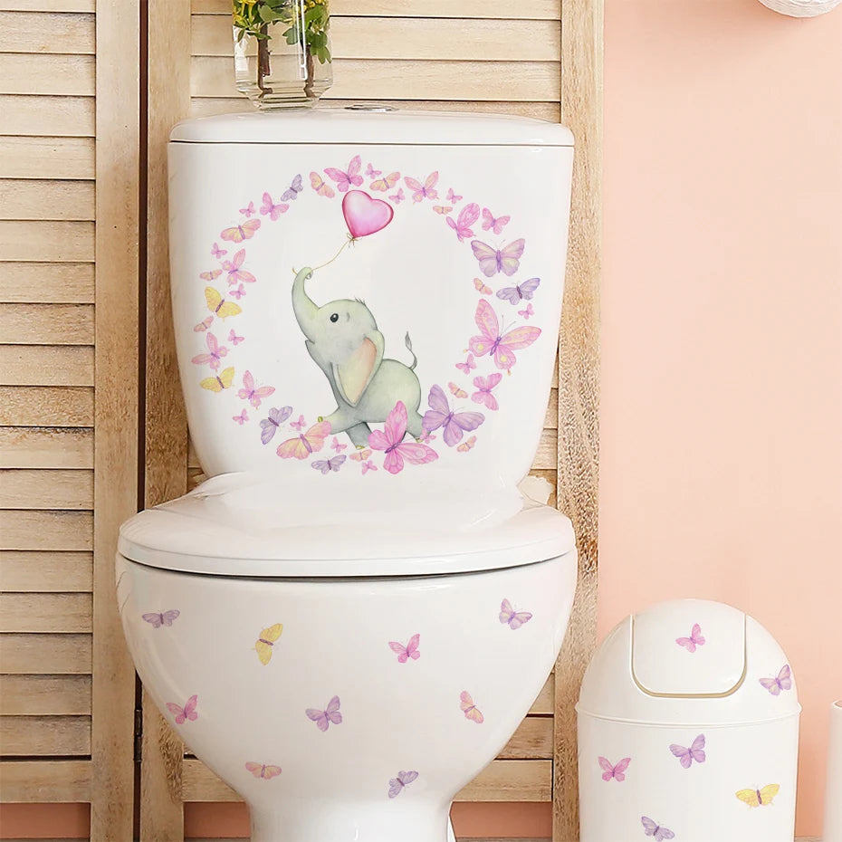 Decorative toilet with elephant and butterfly design on a wooden wall background