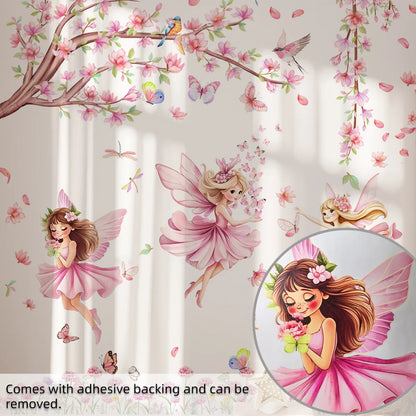 Wall stickers of fairies and floral branches with birds on a light background.