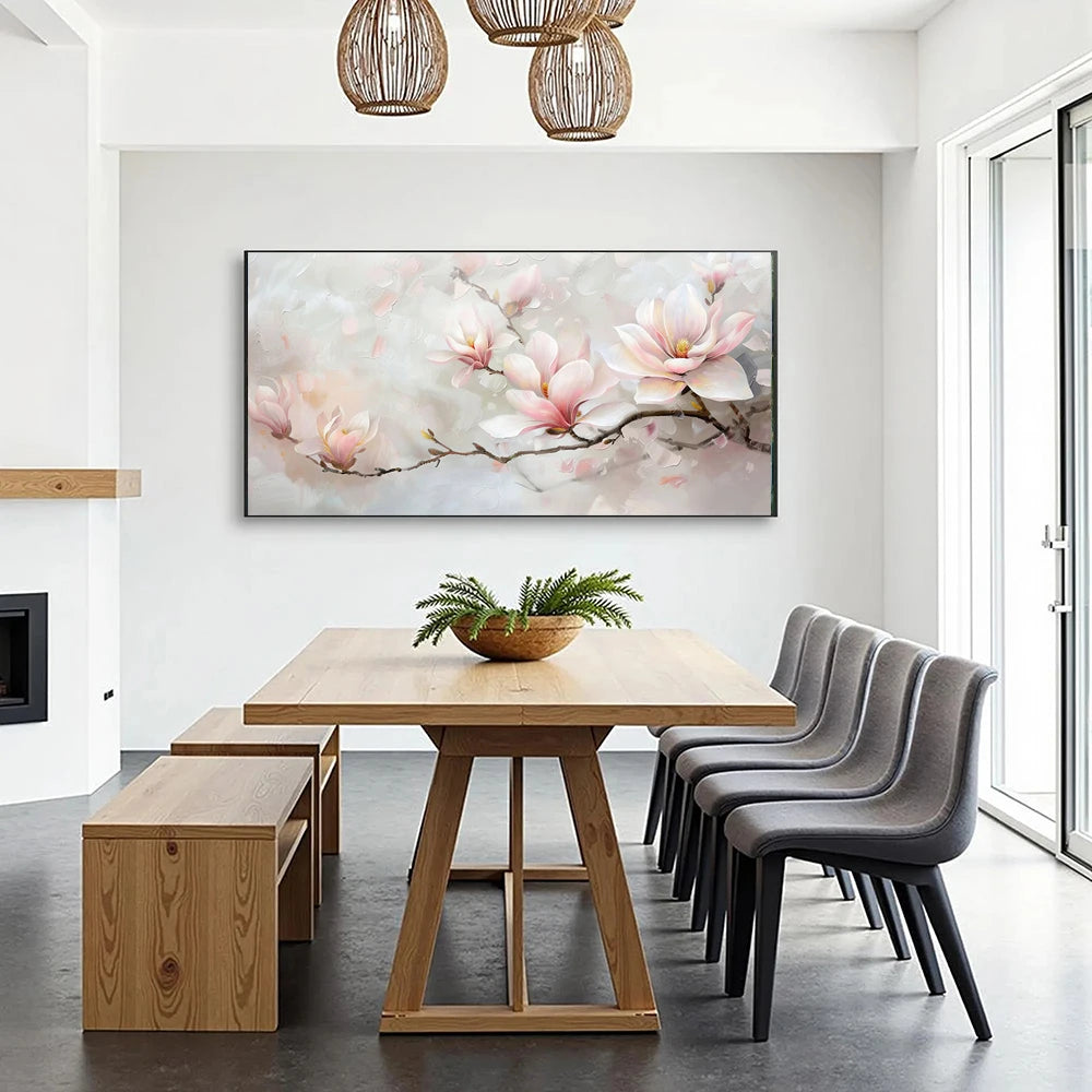 Dining area with wooden table, gray chairs, and a floral painting on the wall.