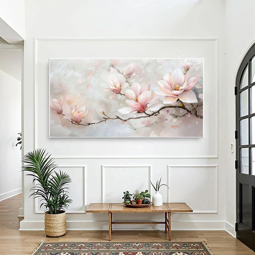 Living room with a large floral painting on the wall, a wooden coffee table, and decorative plants.