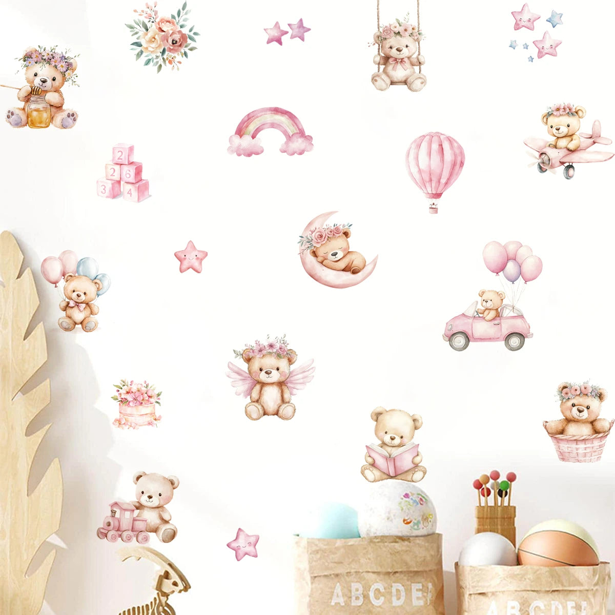 Wall stickers with teddy bears, flowers, and other decorative elements on a white background