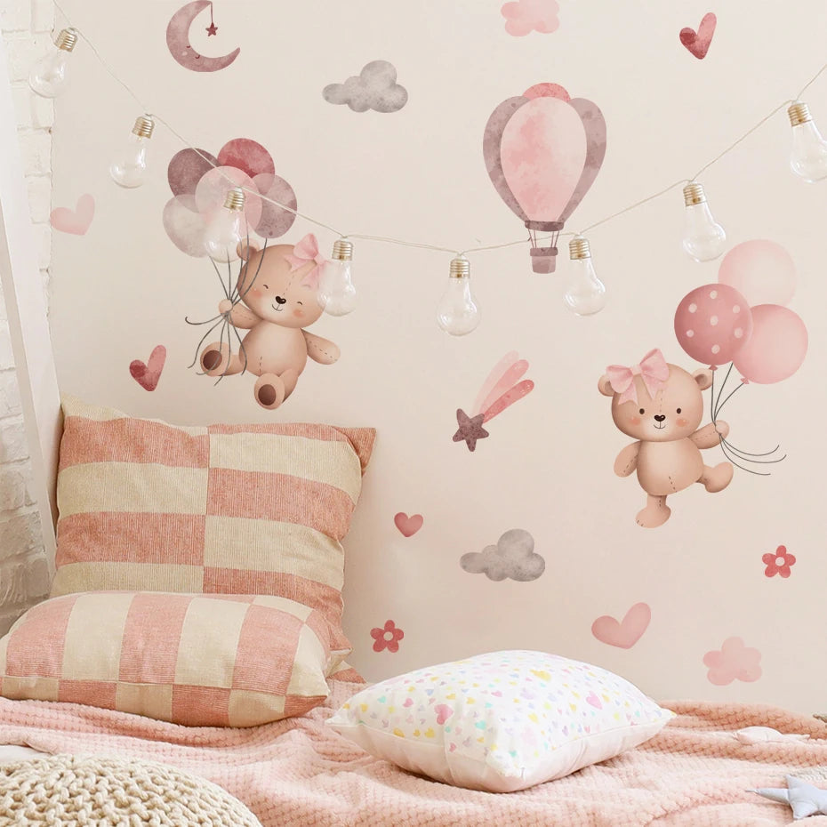 Children's room with teddy bear wall decals, balloons, and checkered pillow.