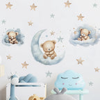 Children's room with teddy bear wall stickers, cloud, and star decorations.
